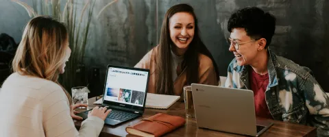 Group of friends with their laptops