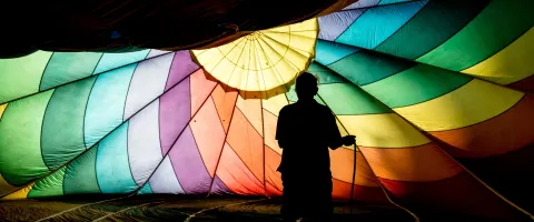Person Holding a colorful Parachute