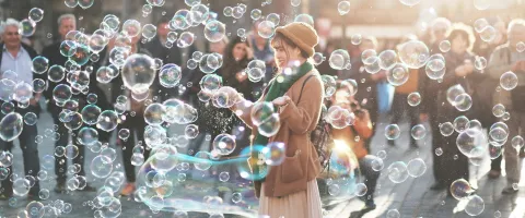 woman joyful with bubbles