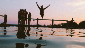 Person Jumping into a Lake