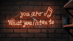 sign on the wall "you are what you listen to"