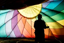 Person Holding a colorful Parachute